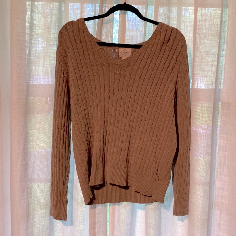 Tan knit sweater.
